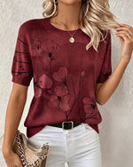 Blusa estampada de manga corta y cuello redondo