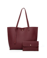 Bolso bandolera de color liso con borlas y gran capacidad