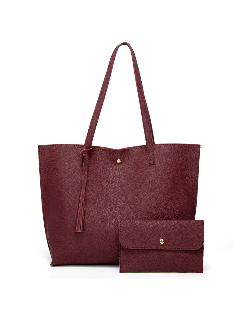 Bolso bandolera de color liso con borlas y gran capacidad