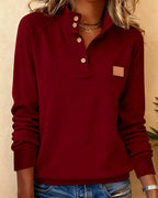 Polo-neck sweater with partially open placket