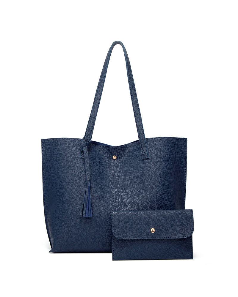 Bolso bandolera de color liso con borlas y gran capacidad
