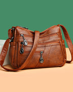 Soft leather crossbody bag with multiple pockets