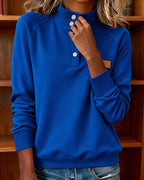 Polo-neck sweater with partially open placket