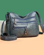 Soft leather crossbody bag with multiple pockets