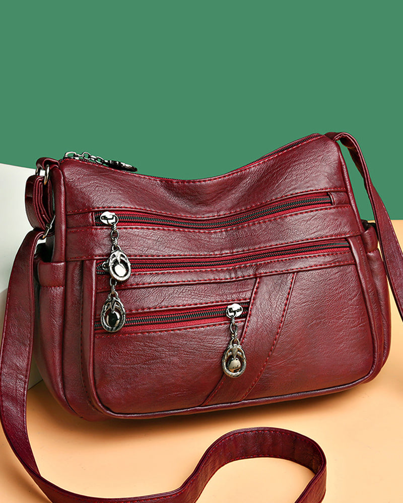 Soft leather crossbody bag with multiple pockets
