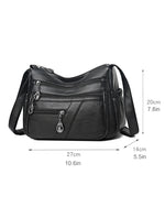 Bolso bandolera de cuero suave con múltiples bolsillos