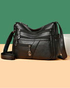 Soft leather crossbody bag with multiple pockets