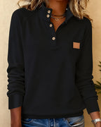 Polo-neck sweater with partially open placket