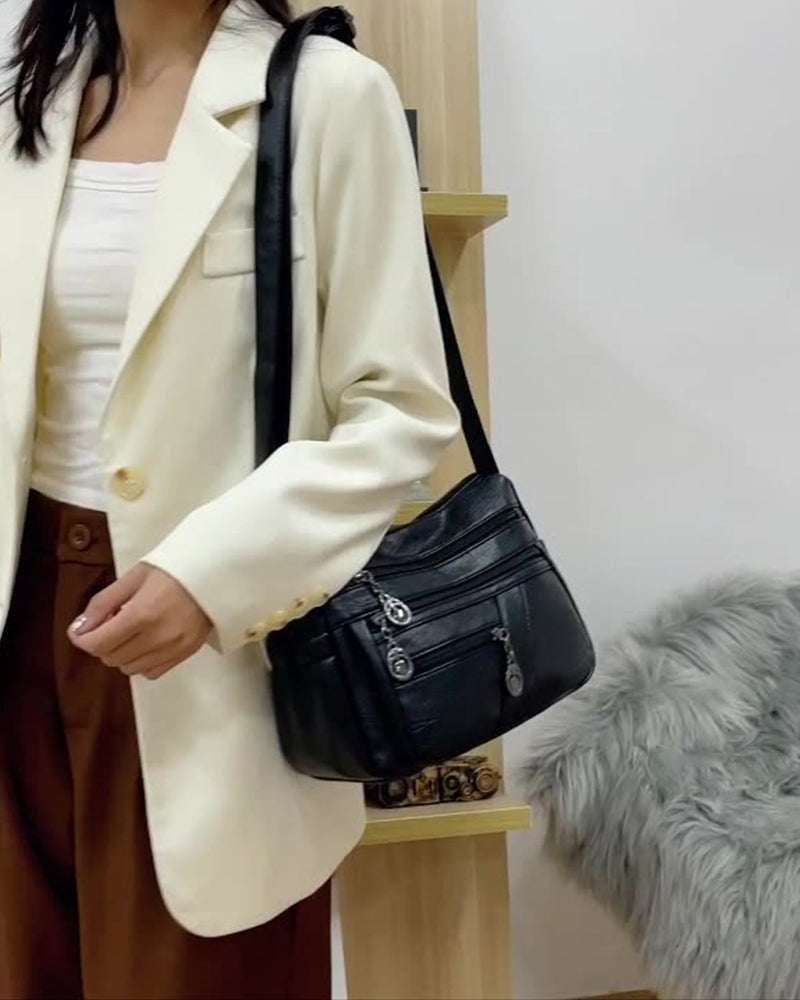 Soft leather crossbody bag with multiple pockets