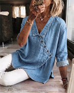Blusa lisa de manga larga con cuello y botones diagonales
