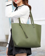 Bolso bandolera de color liso con borlas y gran capacidad