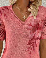 Blusa de punto con cuello en V y estampado floral