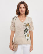 Blusa de punto con cuello en V y estampado floral