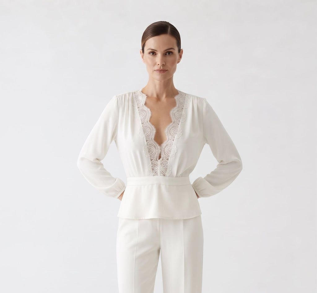 V-neck blouse with lace trim.