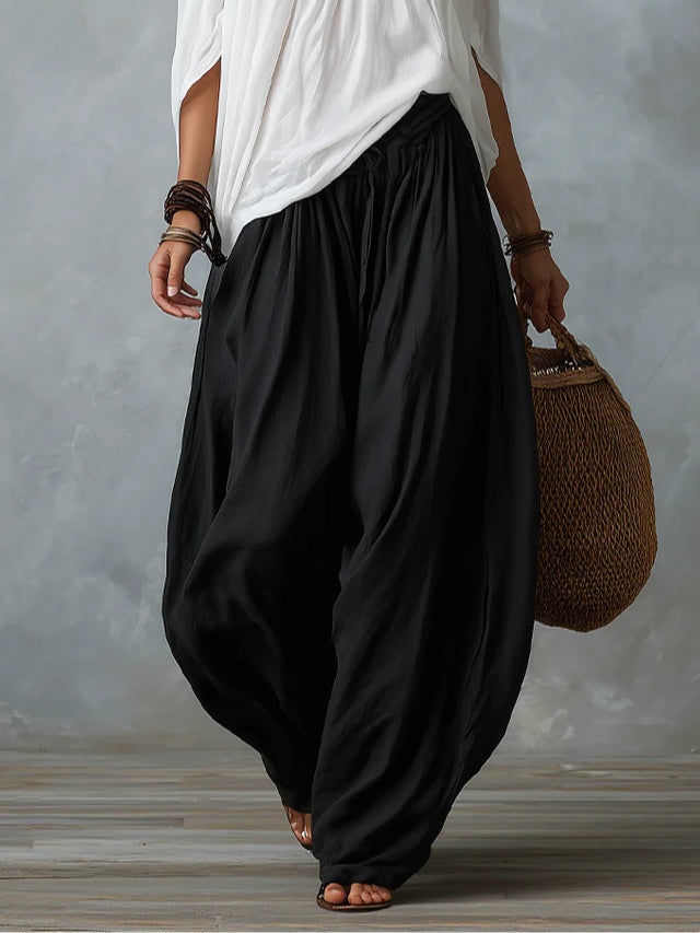 Alba | Conjunto blanco con hombros descubiertos y pantalones tipo farol