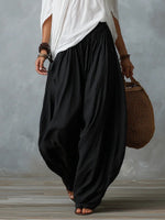 Alba | Conjunto blanco con hombros descubiertos y pantalones tipo farol