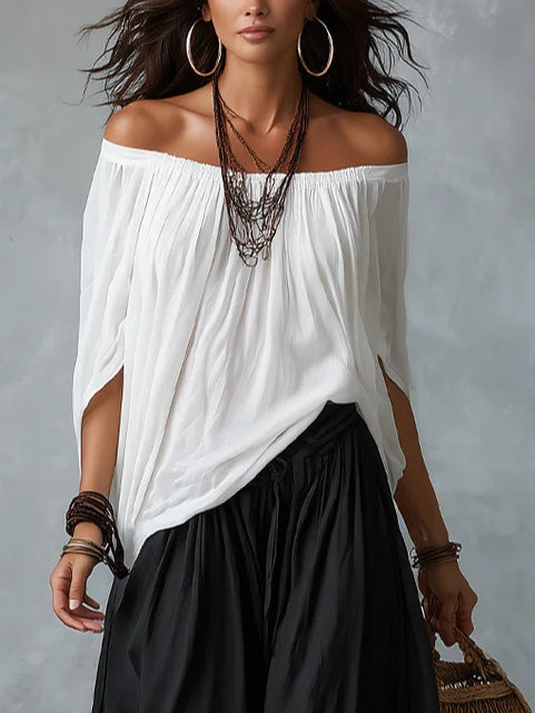 Alba | Conjunto blanco con hombros descubiertos y pantalones tipo farol