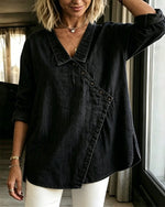 Blusa lisa de manga larga con cuello y botones diagonales