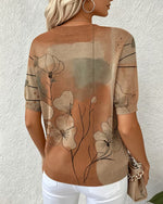 Blusa estampada de manga corta y cuello redondo