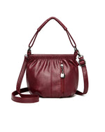 Bolso de mano casual plisado tipo cubo de cuero suave