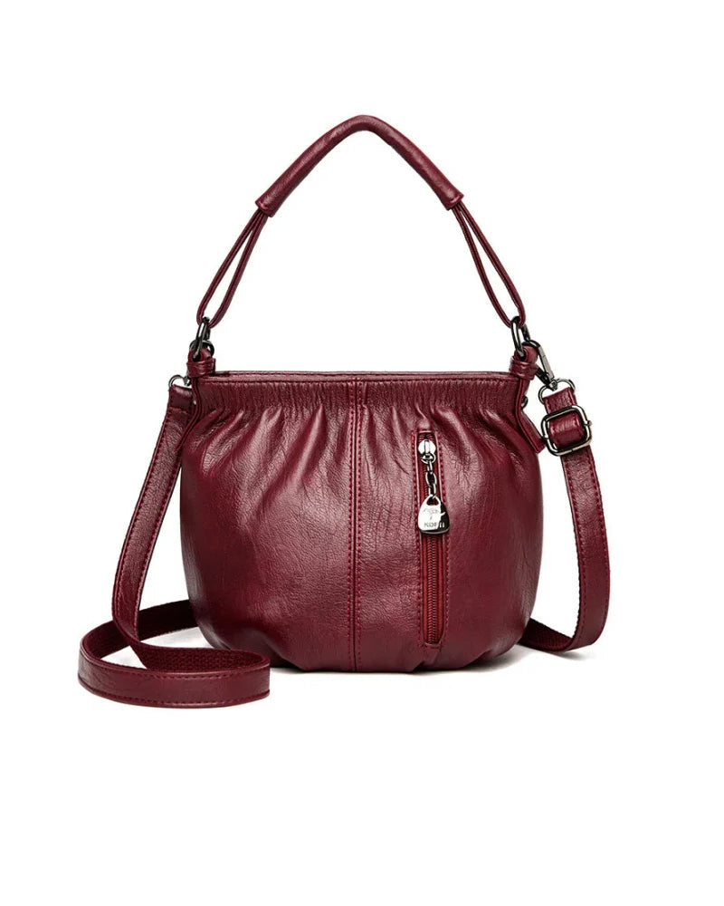 Bolso de mano casual plisado tipo cubo de cuero suave