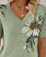 Blusa de punto con cuello en V y estampado floral